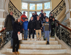 Gruppenbild auf der Marmortreppe in der Baumwollbörse 
˜ Bildnachweis: Dr. Lorena Pethig